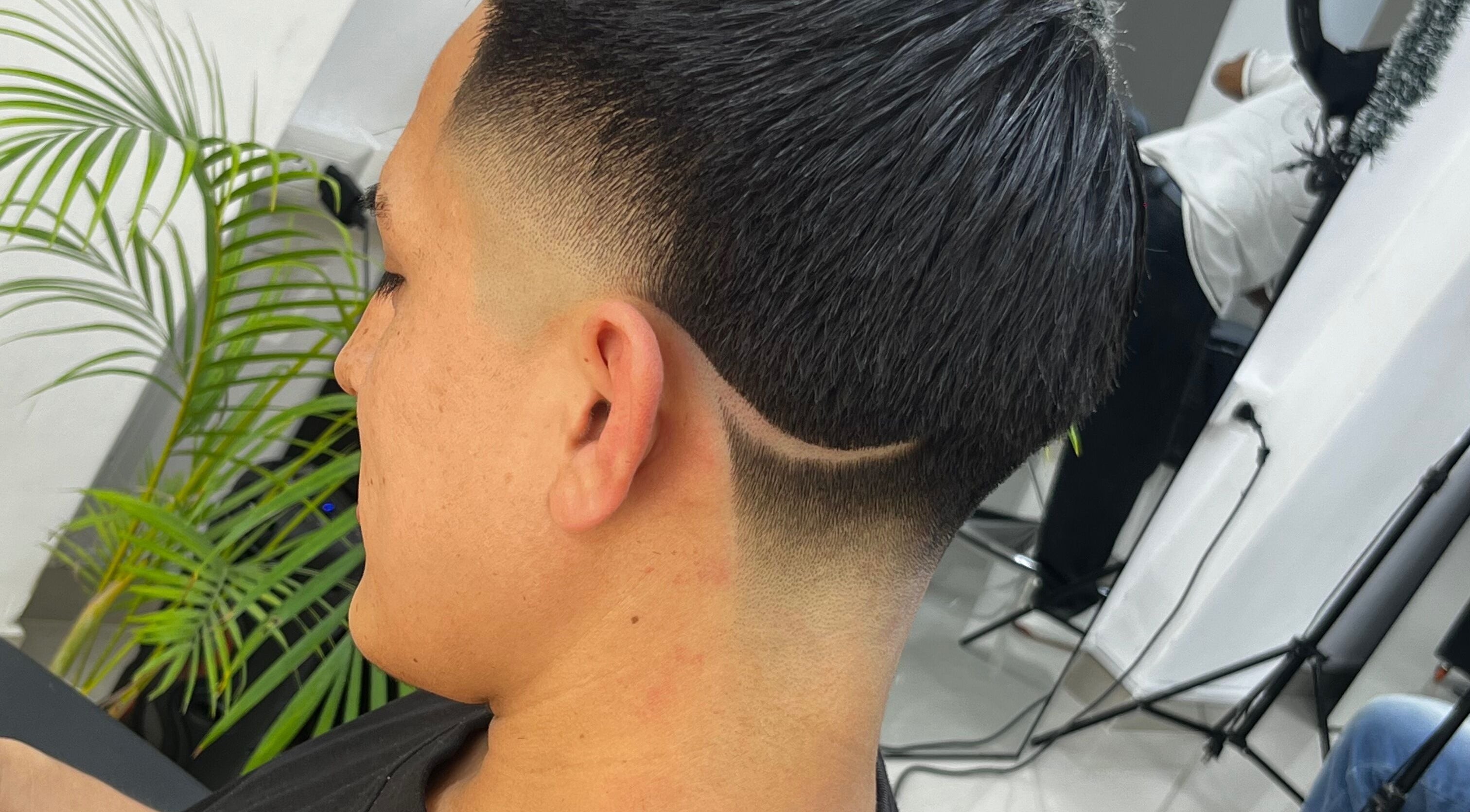 Stylish fade haircut at HENKO HAIR STUDIO, Chiclayo, Lambayeque, PE, showcasing intricate design.