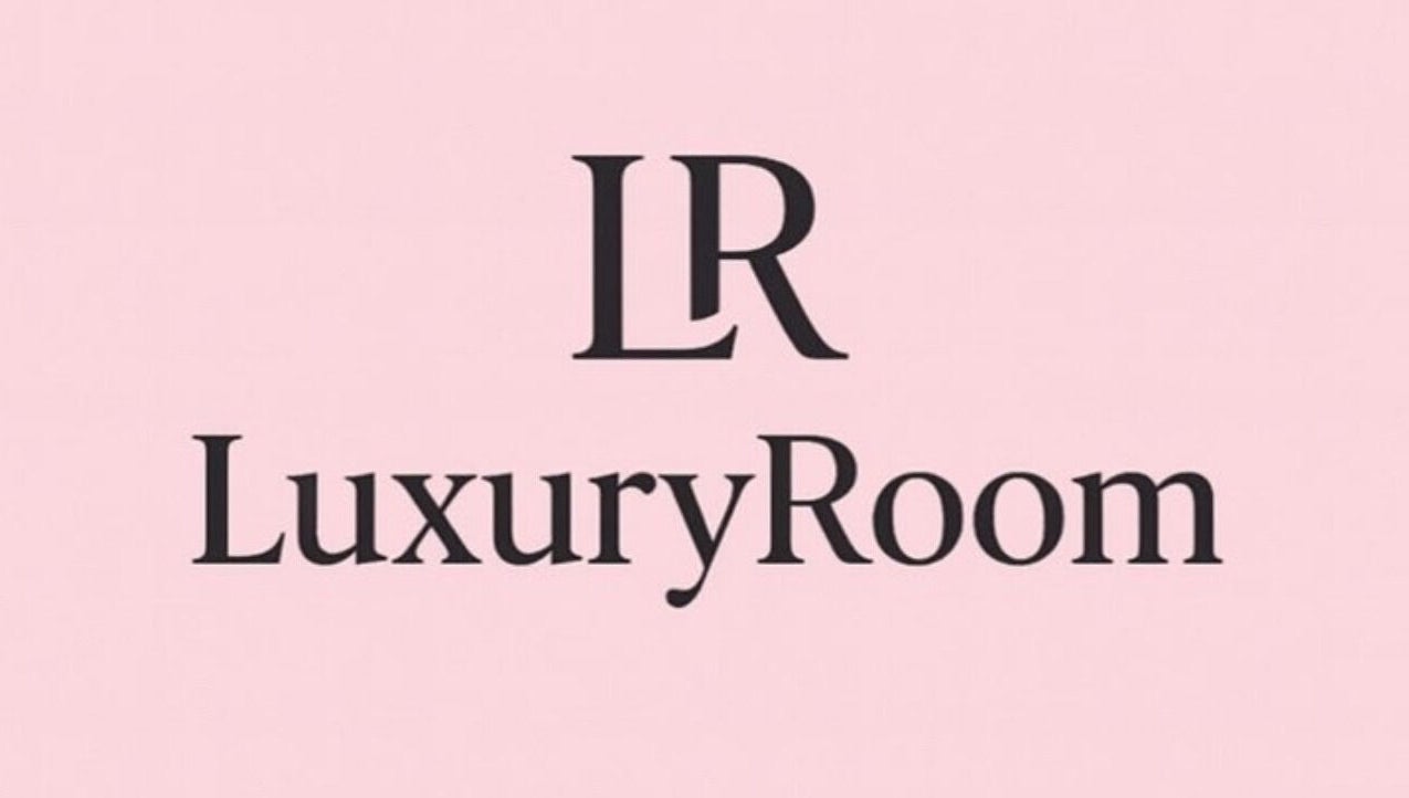 LuxuryRoom's refined logo on a pink background in Kettering, England, GB.
