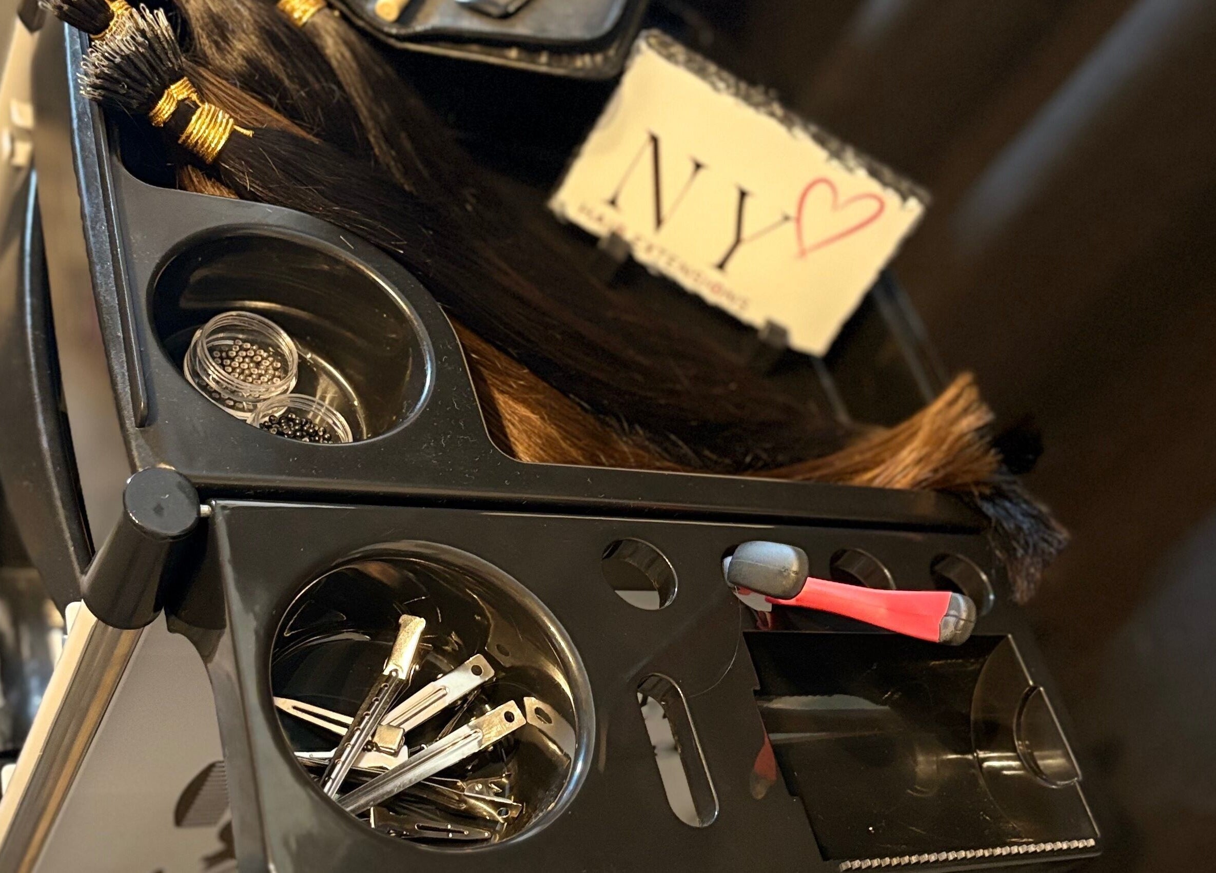 NYHairextensions tool cart with hair extensions and clips in Carlisle, England, GB.