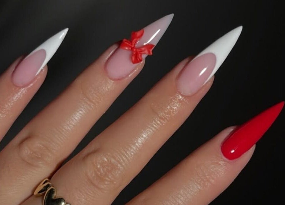 Stylish manicure with vibrant colors at The Beauty Booth, Bloemfontein, Free State, ZA.