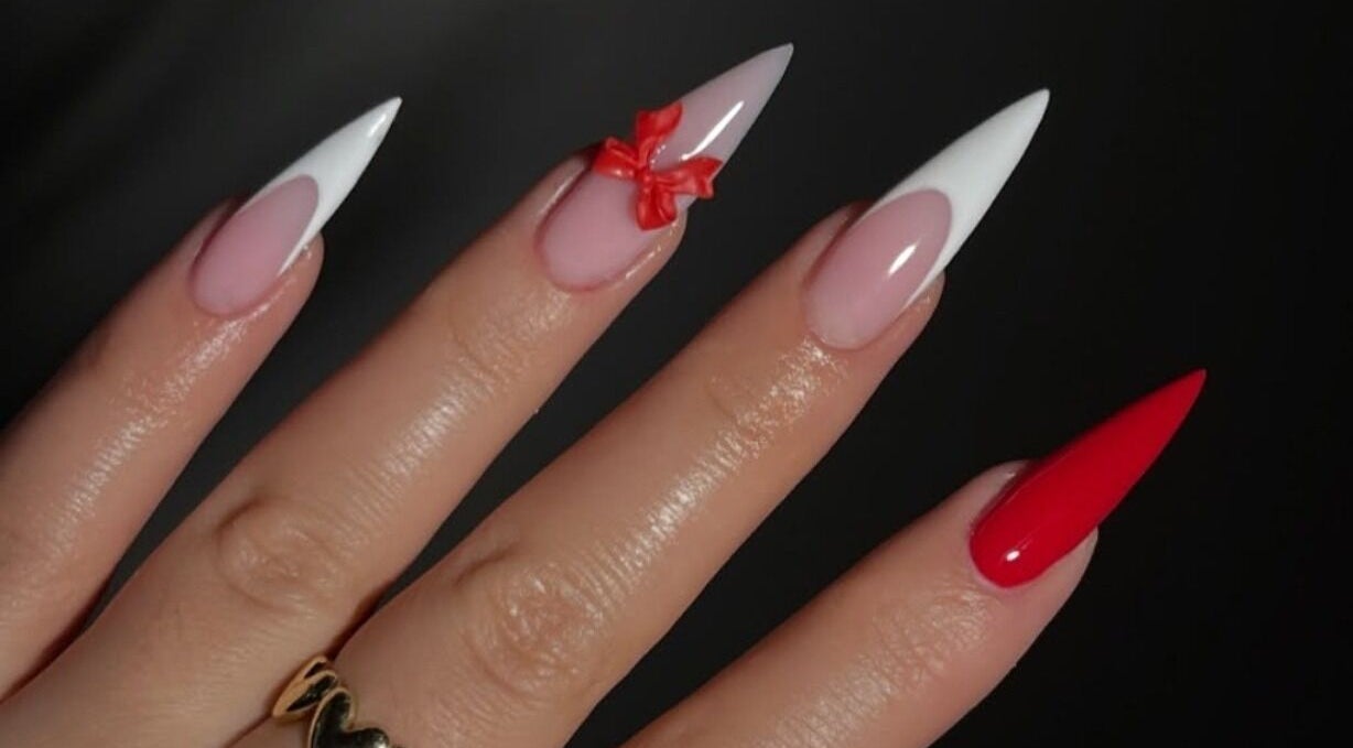 Stylish manicure with vibrant colors at The Beauty Booth, Bloemfontein, Free State, ZA.