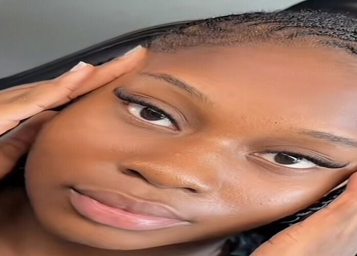 Model showcasing lash extensions at Dijamil luxury lash, Karu, Nasarawa, NG.