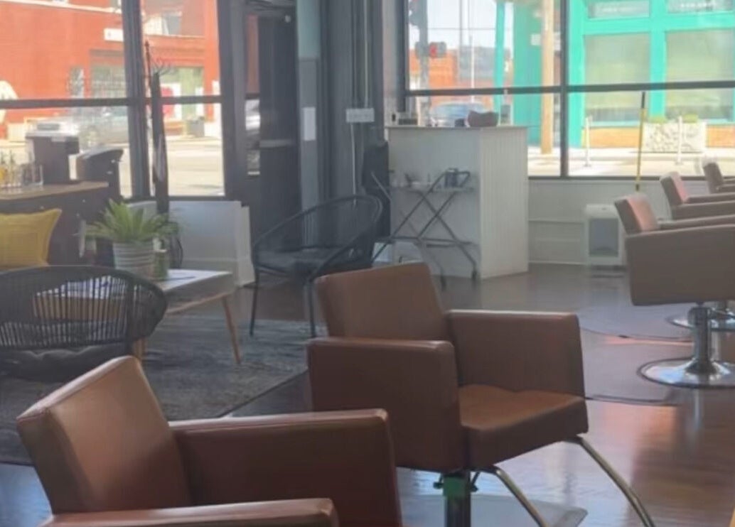 Modern salon interior at Lexi Stice, Kansas City, Missouri, US, featuring stylish chairs and decor.