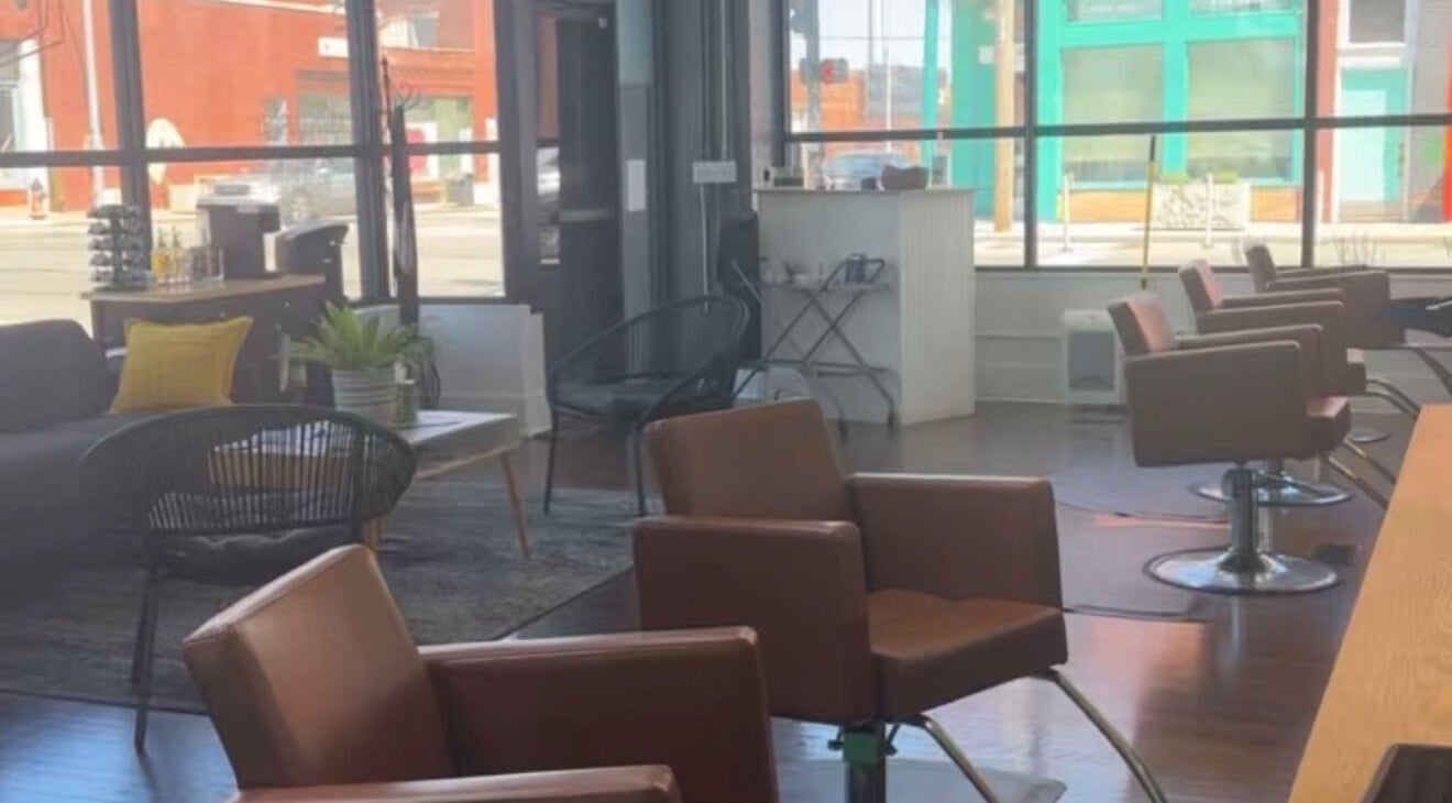 Modern salon interior at Lexi Stice, Kansas City, Missouri, US, featuring stylish chairs and decor.
