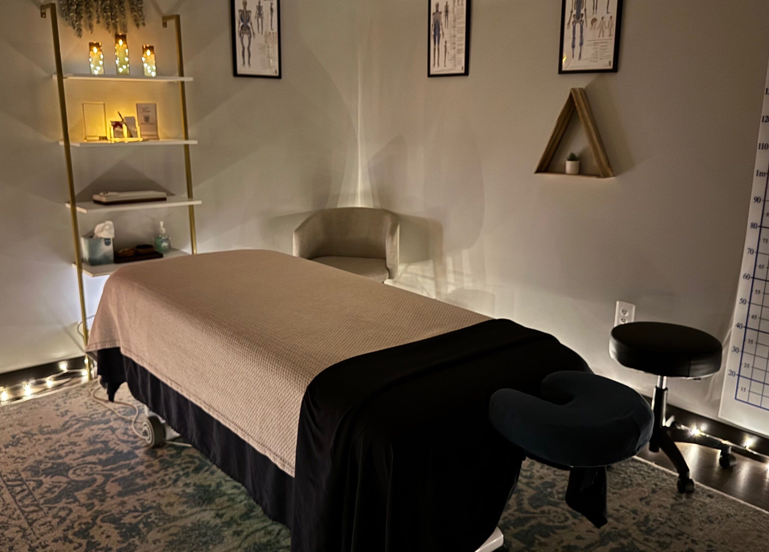 Relaxing massage room at StillPoint Massage & Bodywork, Leesburg, Virginia, US with soft lighting and calming decor.