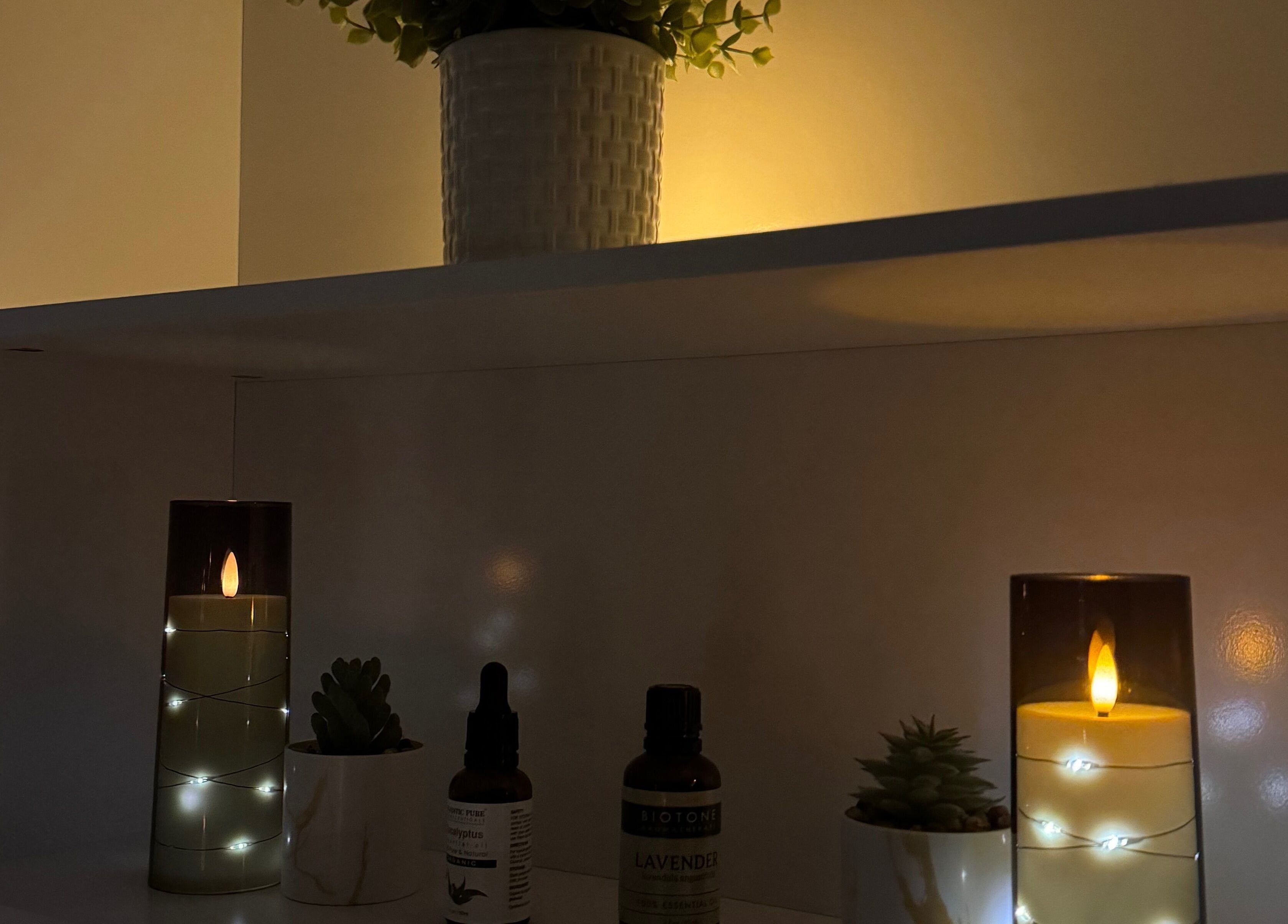 Warm candlelights and plant decor at StillPoint Massage & Bodywork, Leesburg, Virginia, US.