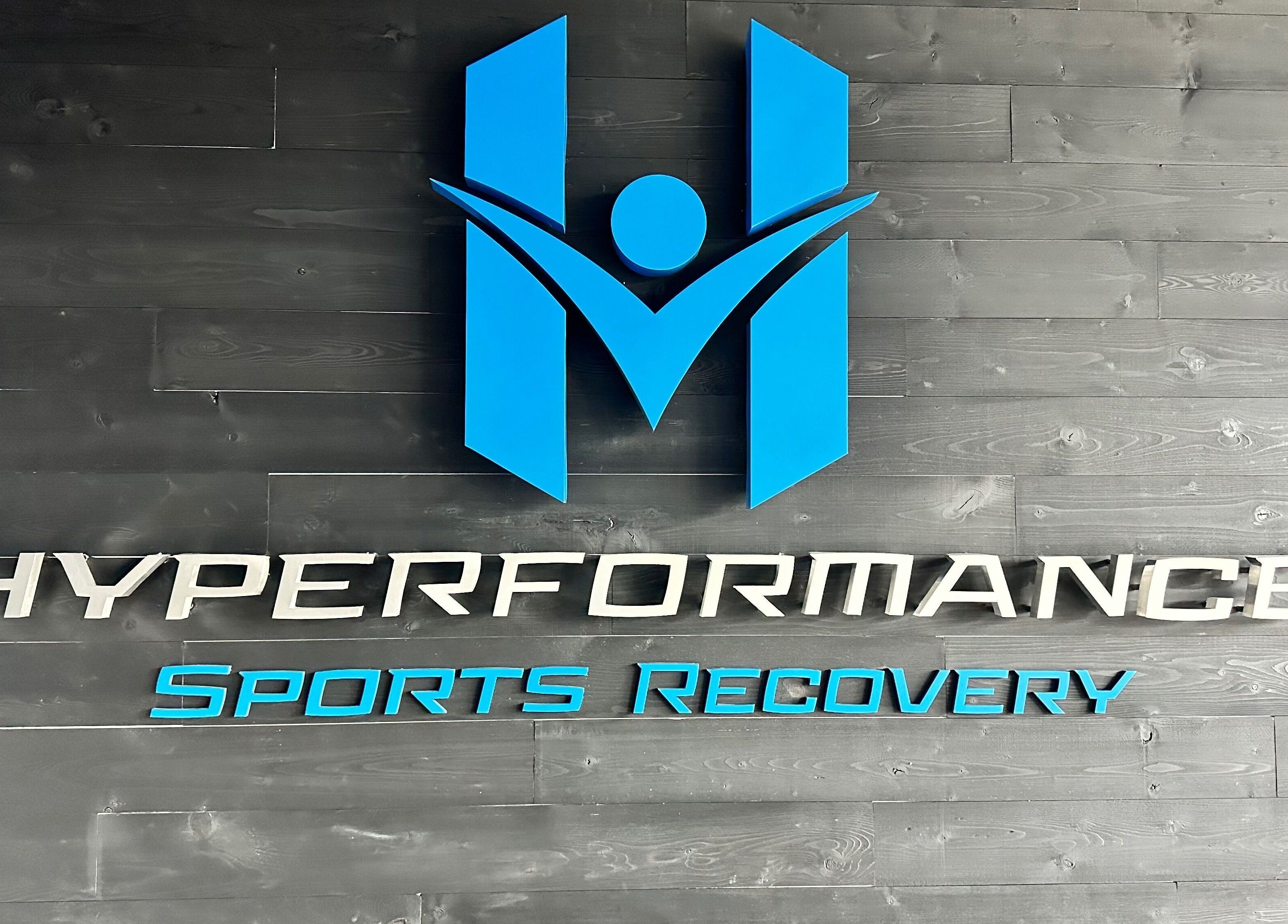 Logo for Hyperformance Sports Recovery (Fitstop Granger) in Granger, Indiana, US, featuring modern blue design.