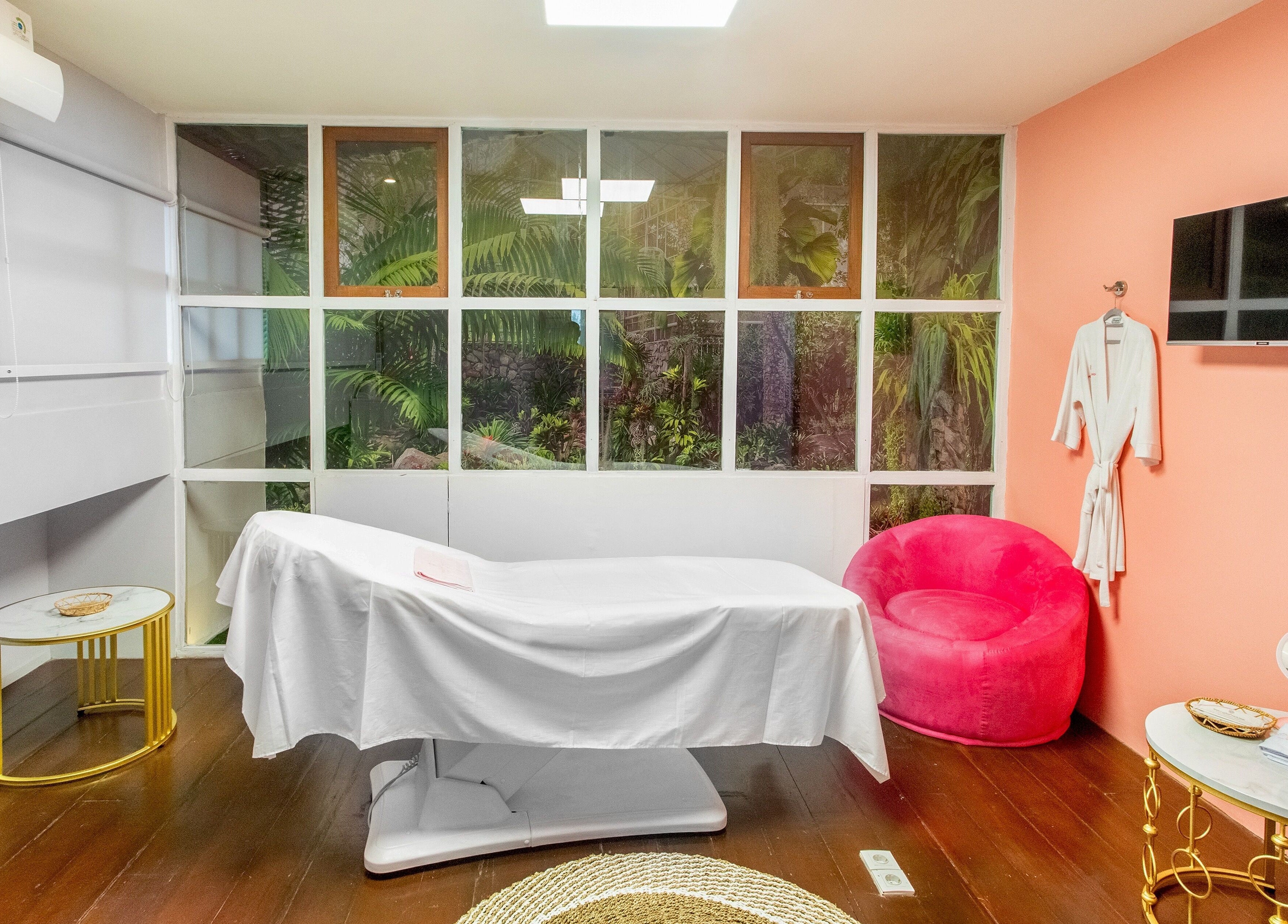 Relaxing massage room at Pro Epil House Ubud featuring serene decor in Bali, Bali, ID.