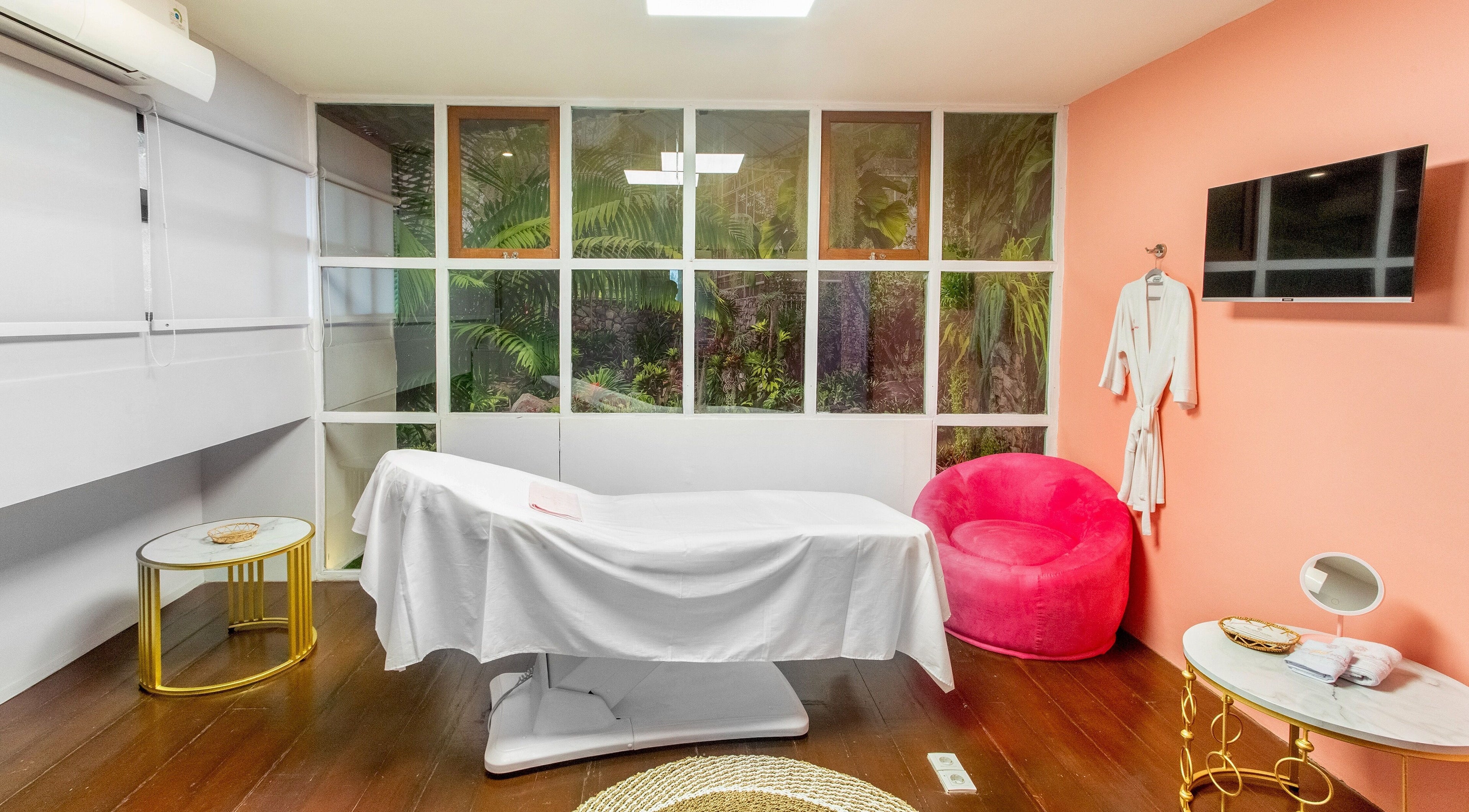 Relaxing massage room at Pro Epil House Ubud featuring serene decor in Bali, Bali, ID.