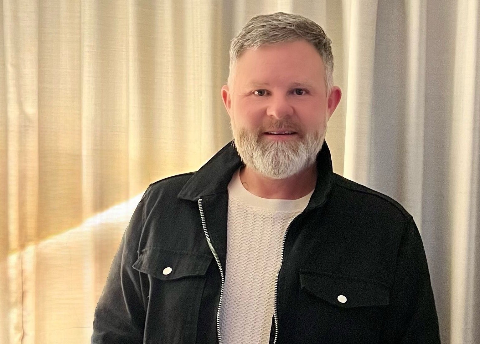 Person smiling in front of curtains at Shawn Antony Mobile Hairdresser & Barber, Sutton-in-ashfield, England, GB.