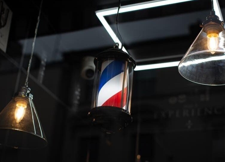 Stylish lighting and barber pole at Bar Bar Co, Brentwood offers a welcoming vibe in Brentwood, England, GB.