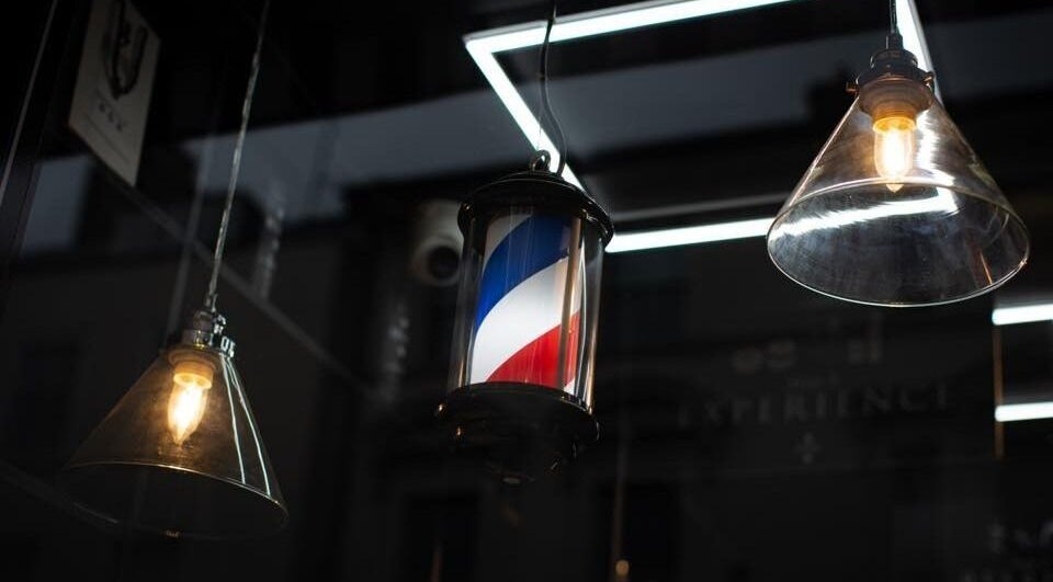 Stylish lighting and barber pole at Bar Bar Co, Brentwood offers a welcoming vibe in Brentwood, England, GB.