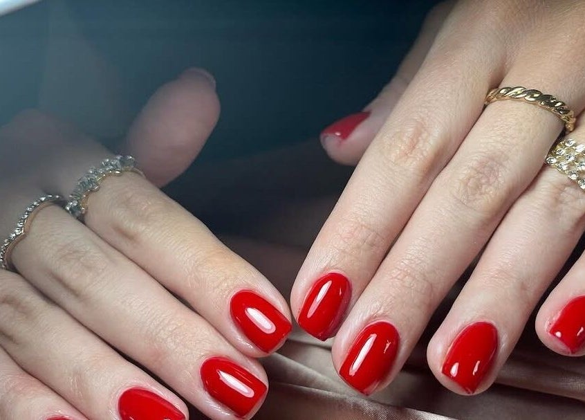 Elegant red manicure at Coco’s Nails located in Centurion, Gauteng, ZA.