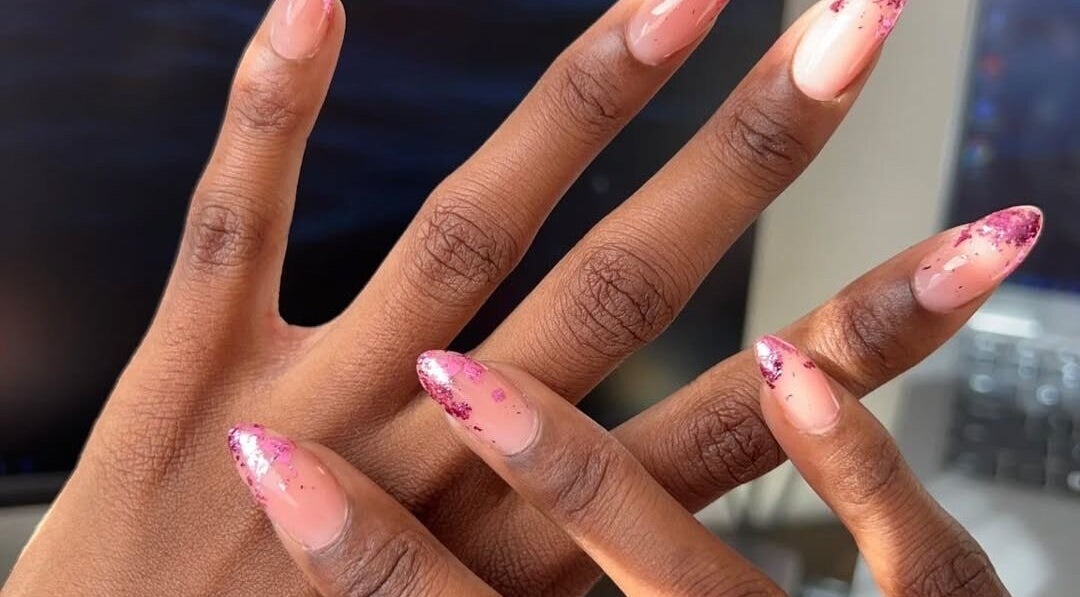 Pink glitter nails at Coco’s Nails, Centurion, Gauteng, ZA, showcasing elegant nail art.
