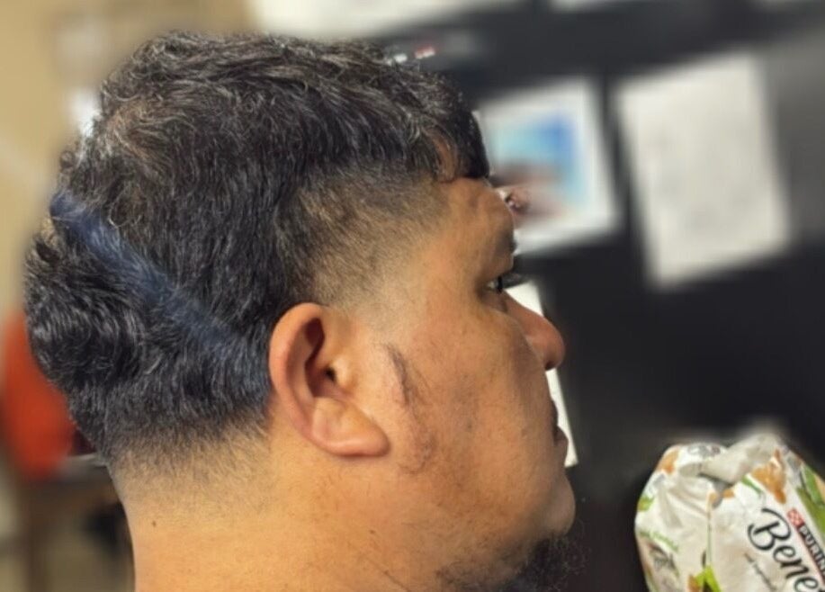 Close-up of a sleek fade haircut at davianscutzz, Dallas, Texas, US, showcasing precision and style.