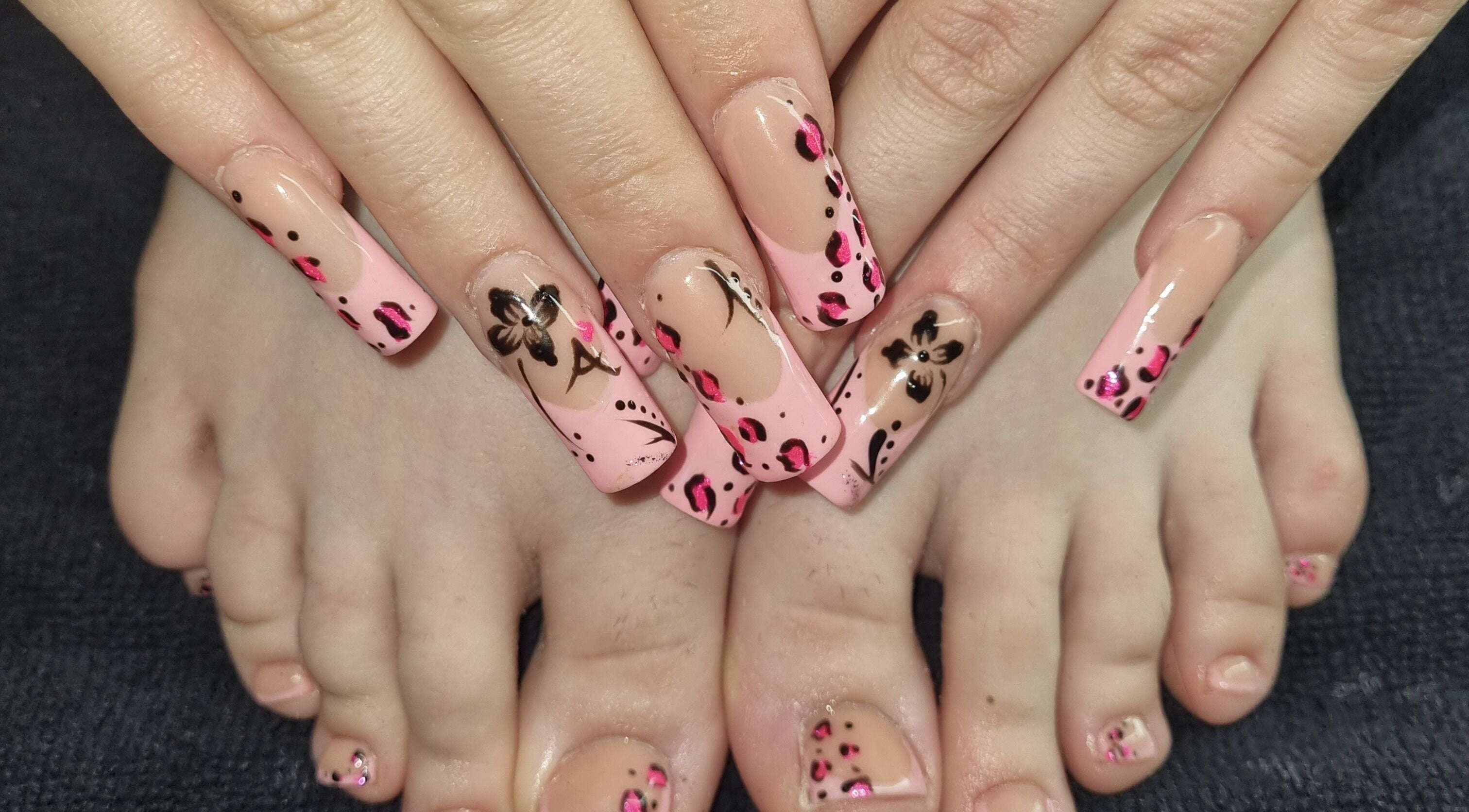 Floral and leopard nail art by Nails by Stacey, Bilston, England, GB. Stunning hand and foot design.