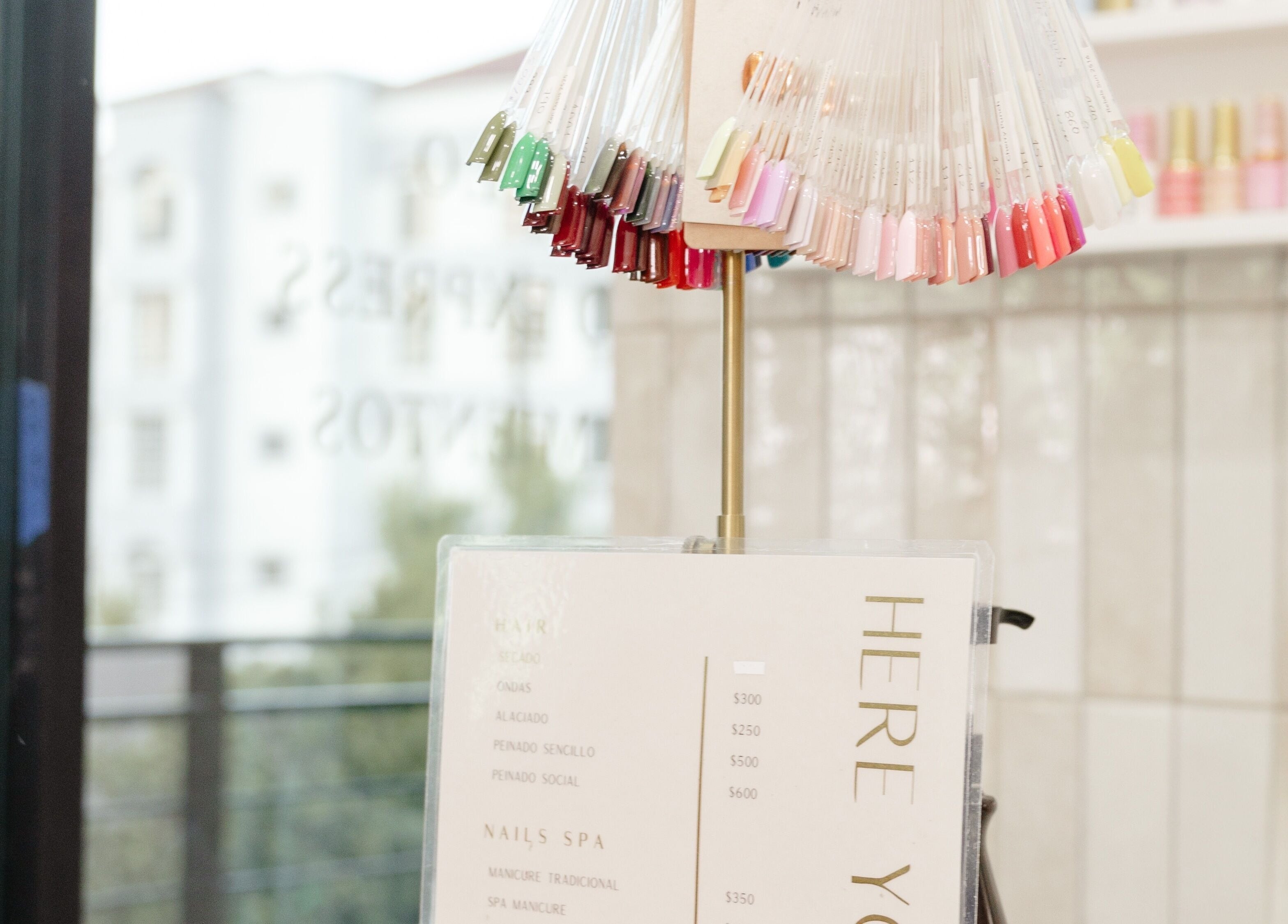 Nail samples at Beauty Art. Studio, Tijuana, Baja California, MX, showcasing vibrant color options.