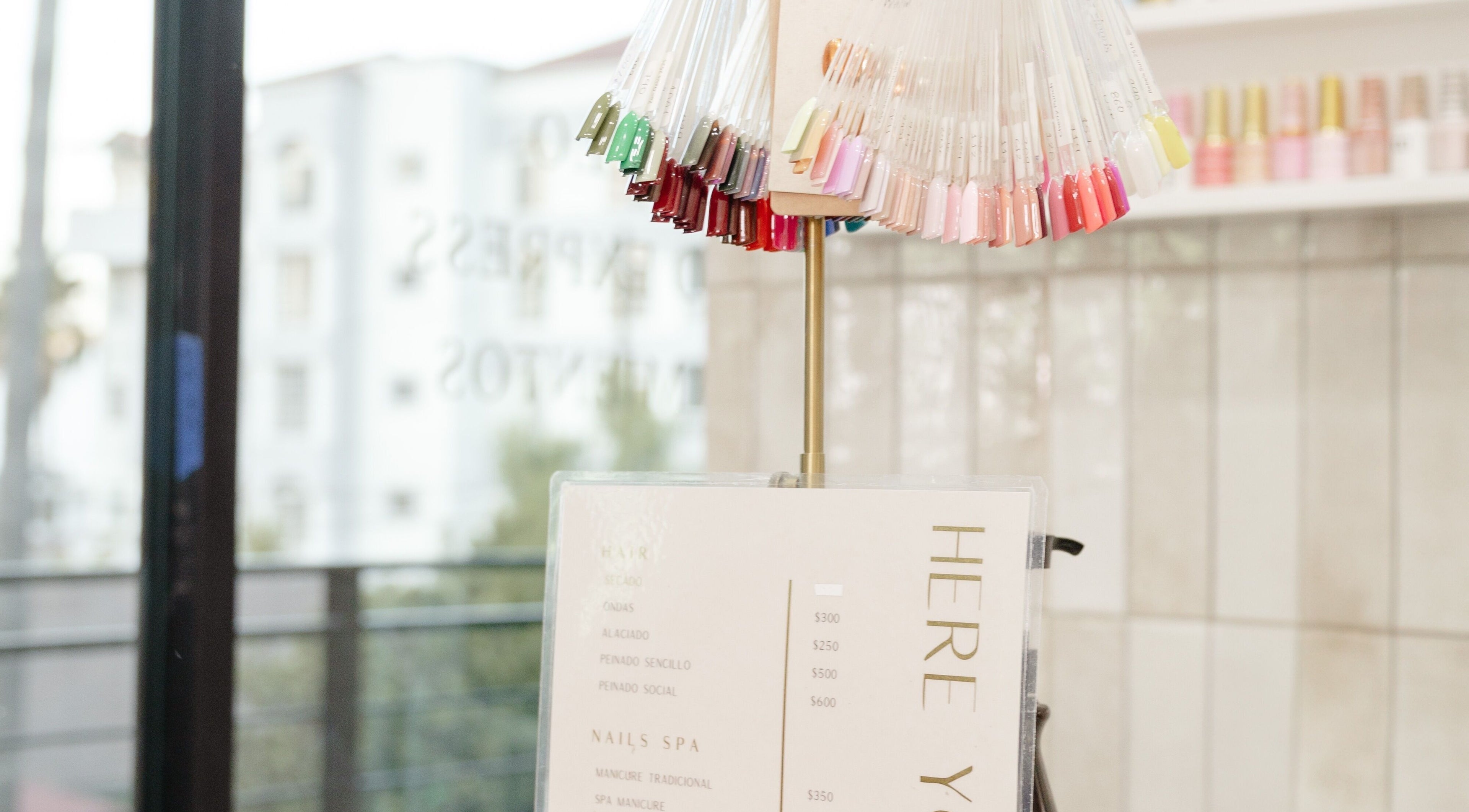 Nail samples at Beauty Art. Studio, Tijuana, Baja California, MX, showcasing vibrant color options.