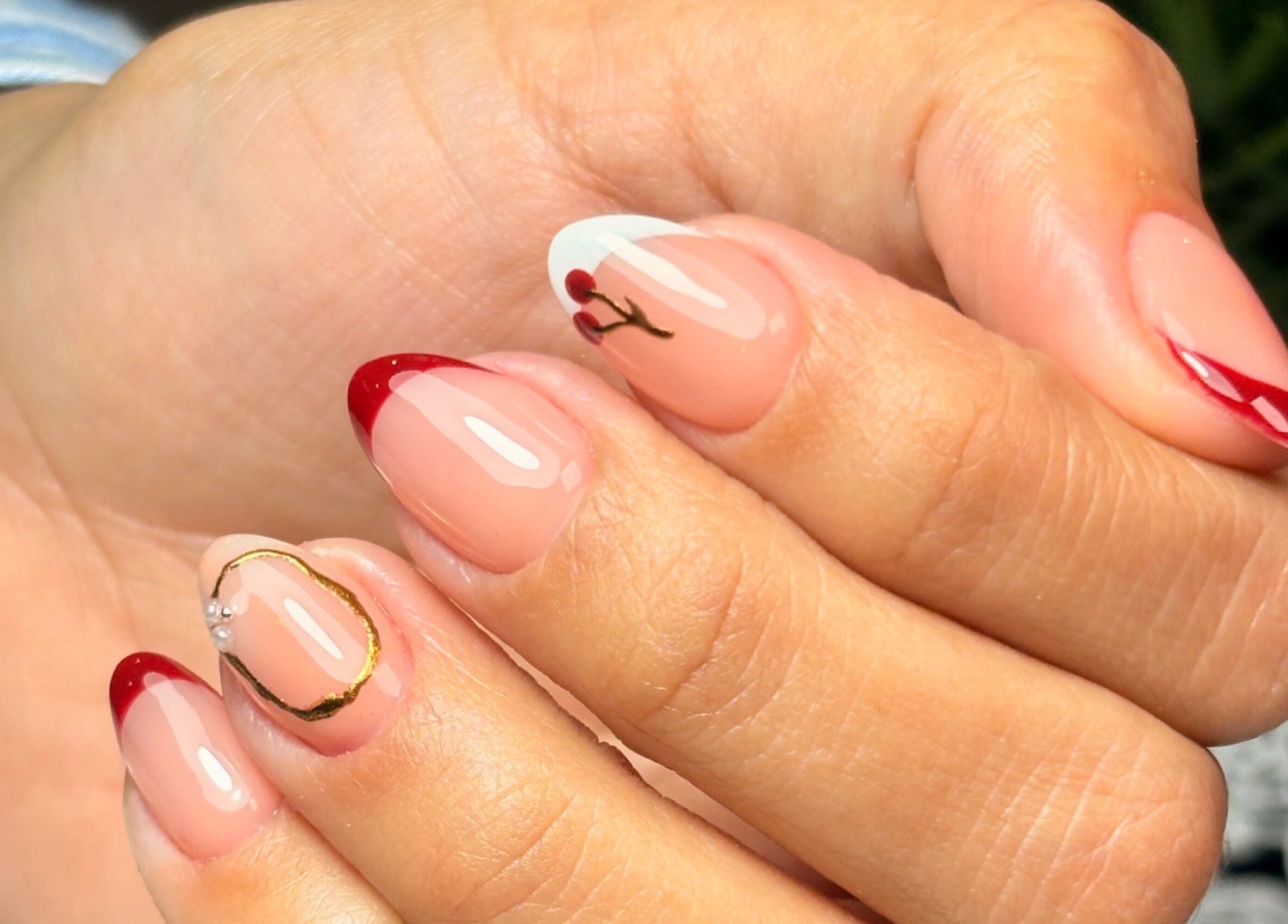Stylish nail design with red tips at AleStudioNails, Santiago Y Zaraíche, Región De Murcia, ES.