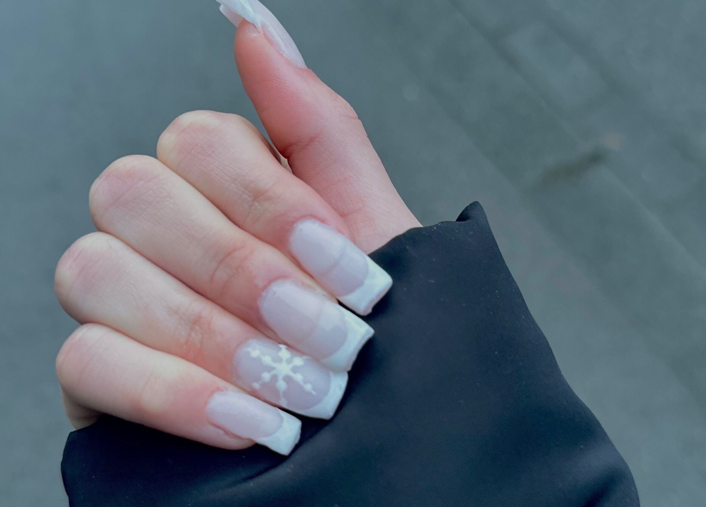White snowflake nail art at Nails_By_Melissa in Differdange, Esch-sur-alzette, LU. Chic, elegant manicure.
