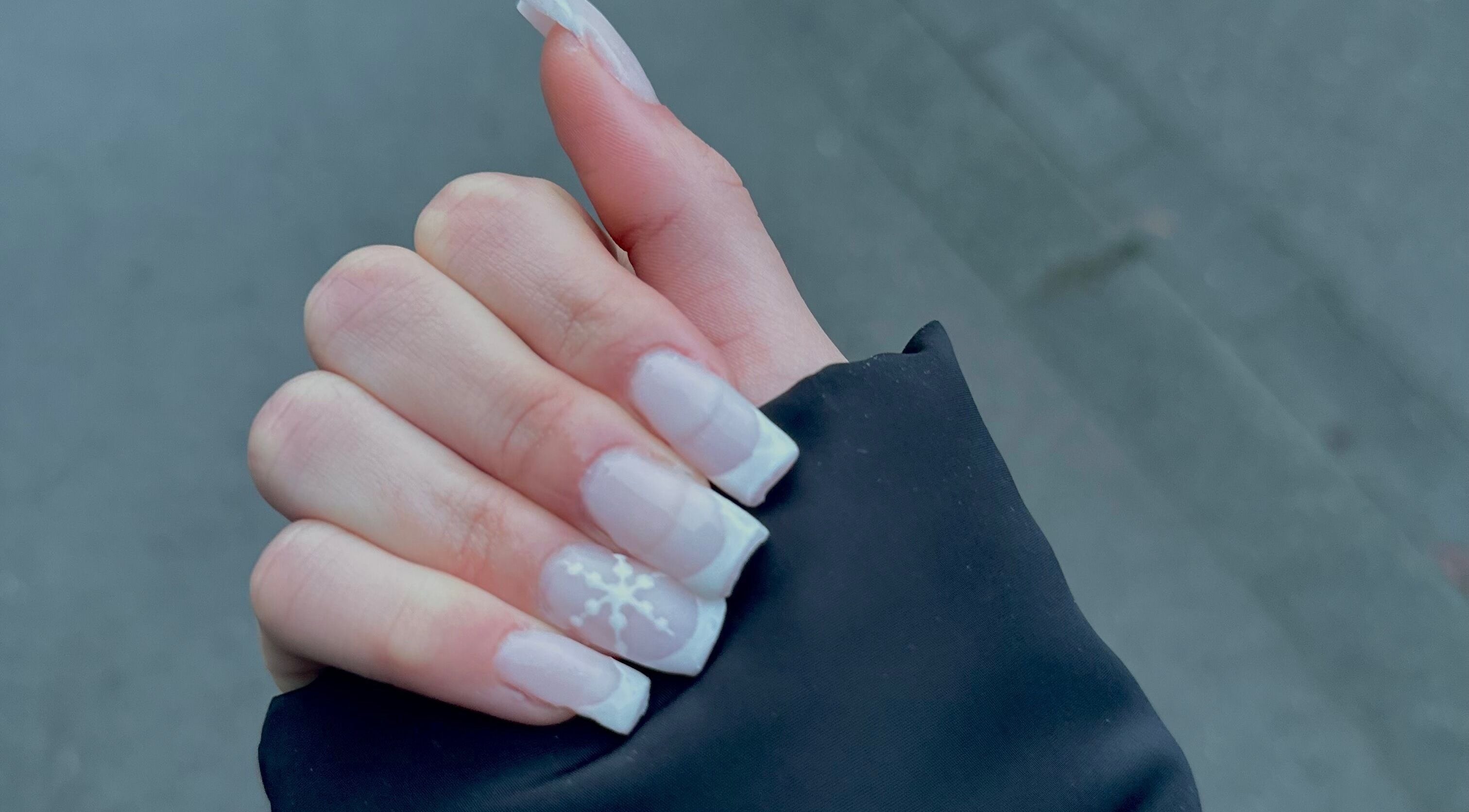 White snowflake nail art at Nails_By_Melissa in Differdange, Esch-sur-alzette, LU. Chic, elegant manicure.