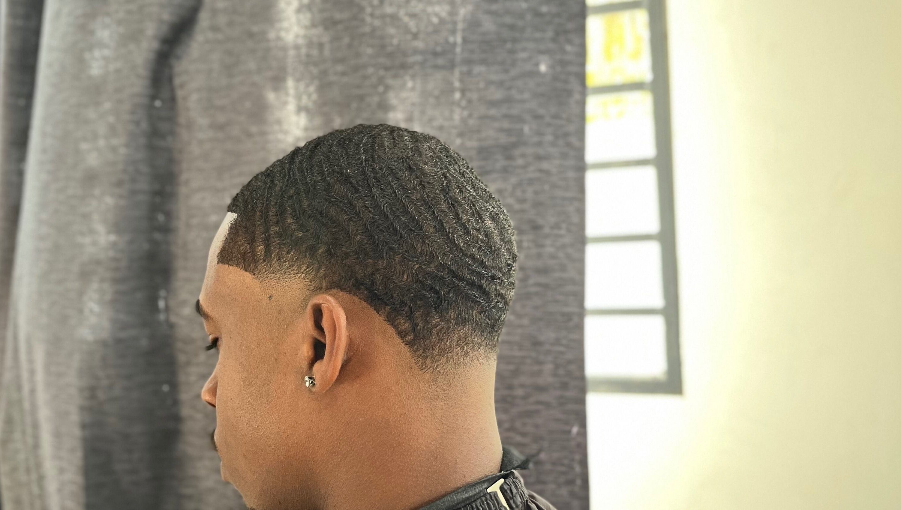 Close-up of a fresh fade haircut with waves at JAYHUNCHO the barber, Paramaribo, Paramaribo, SR.