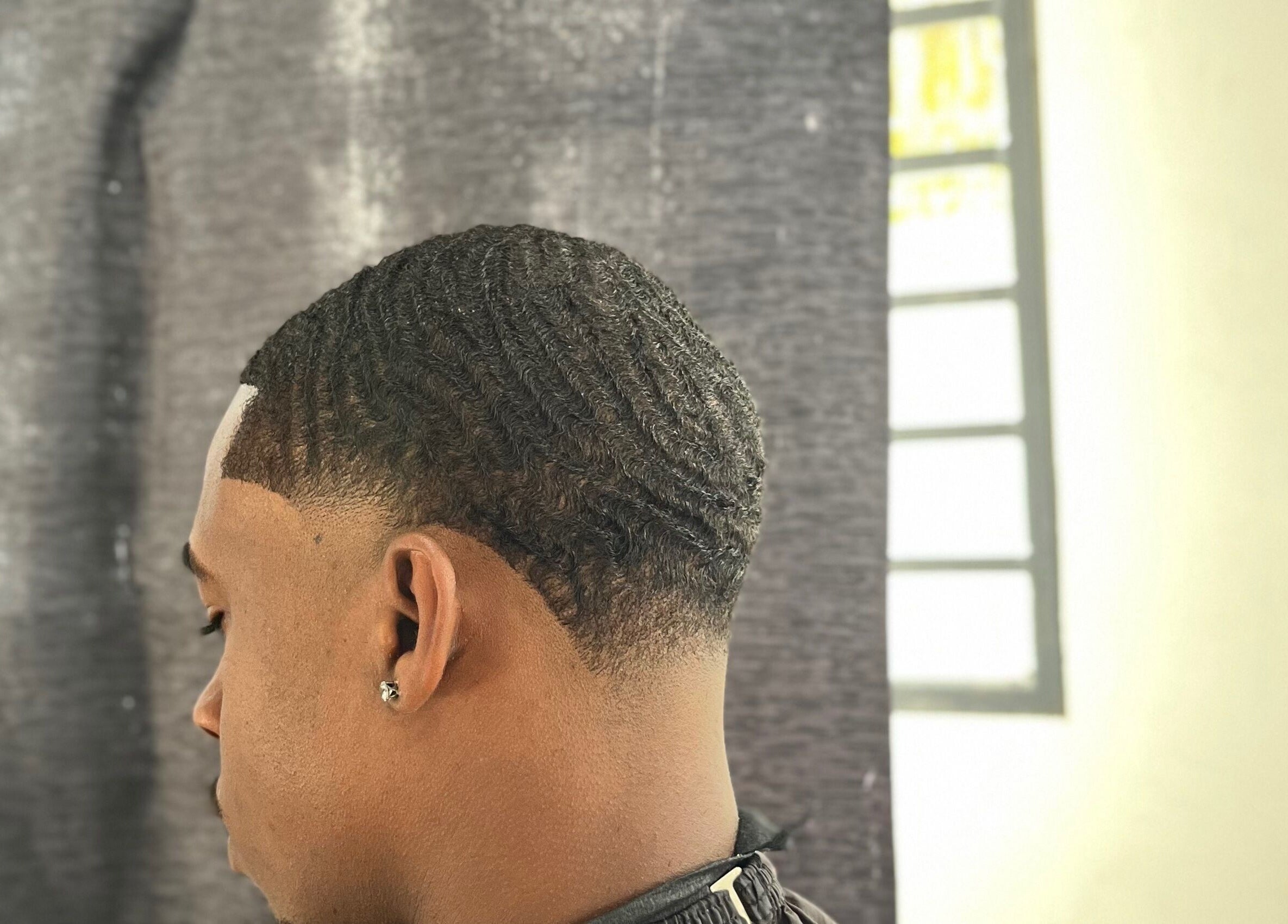 Close-up of a fresh fade haircut with waves at JAYHUNCHO the barber, Paramaribo, Paramaribo, SR.