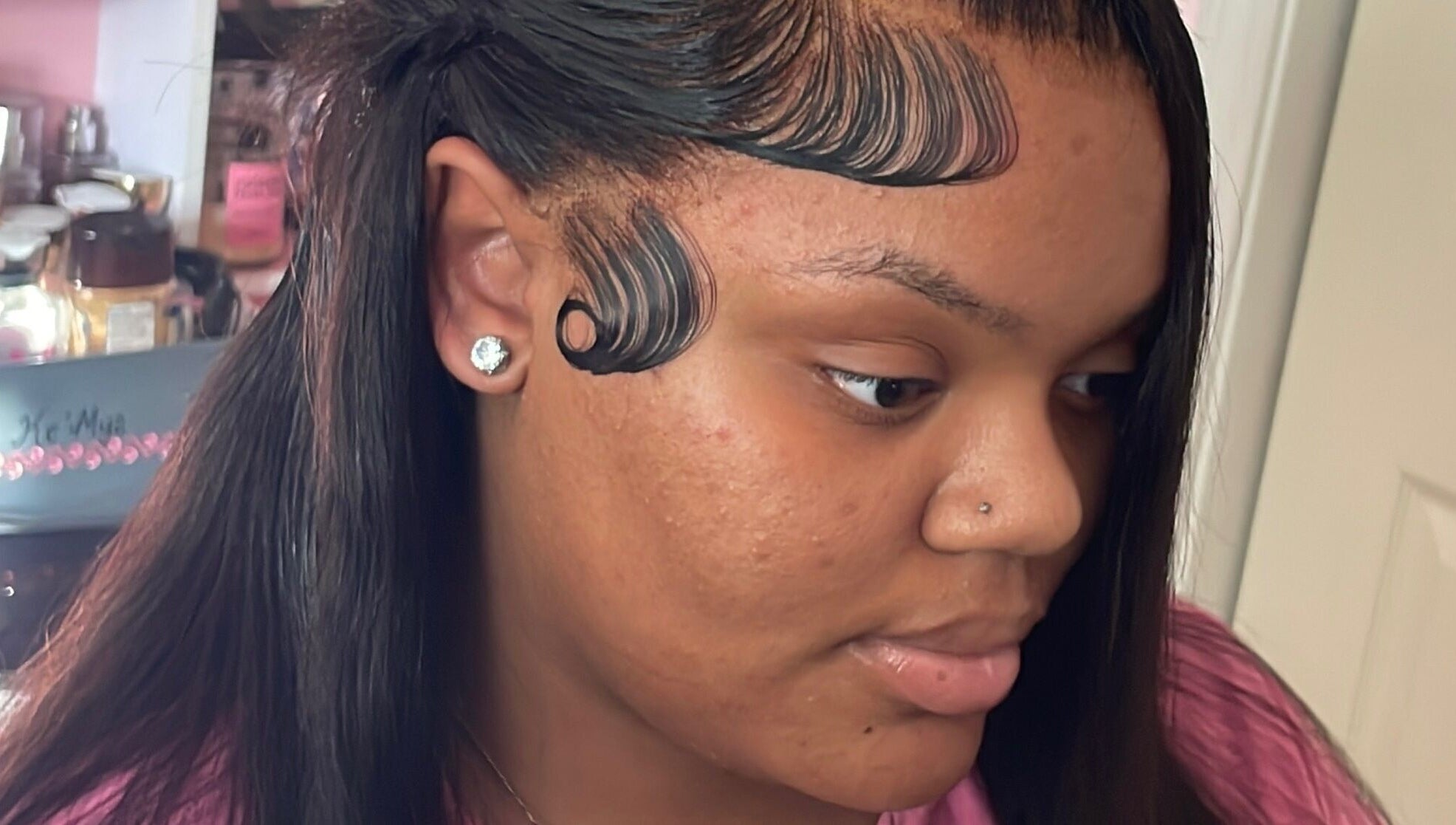 Elegant hair styling at LuxuryLaced, St. Marys, Georgia, US, showcasing intricate edge design.