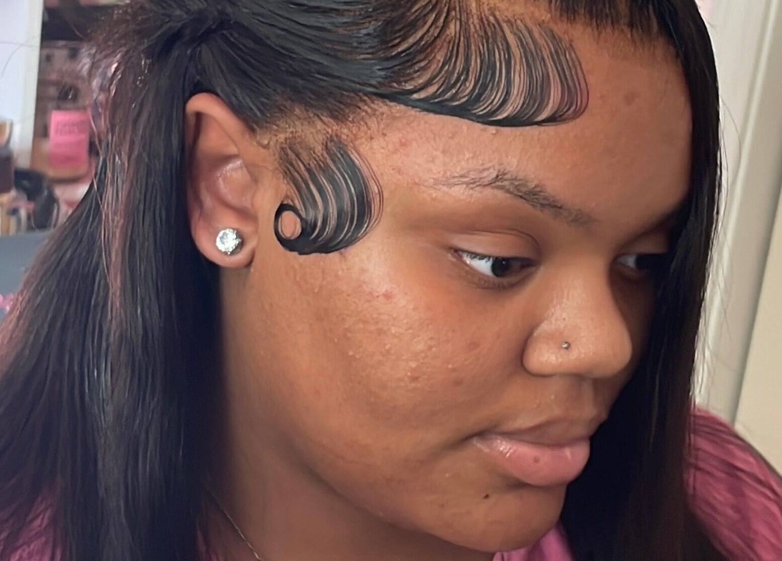 Elegant hair styling at LuxuryLaced, St. Marys, Georgia, US, showcasing intricate edge design.