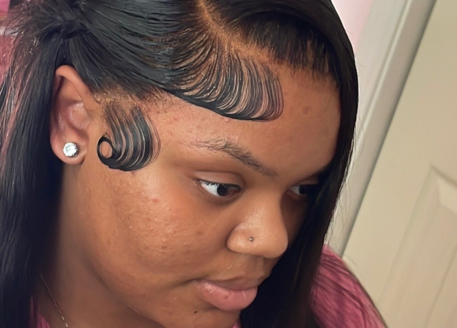 Detailed hair design displayed at LuxuryLaced, St. Marys, Georgia, US, showcasing sleek style and expert craftsmanship.