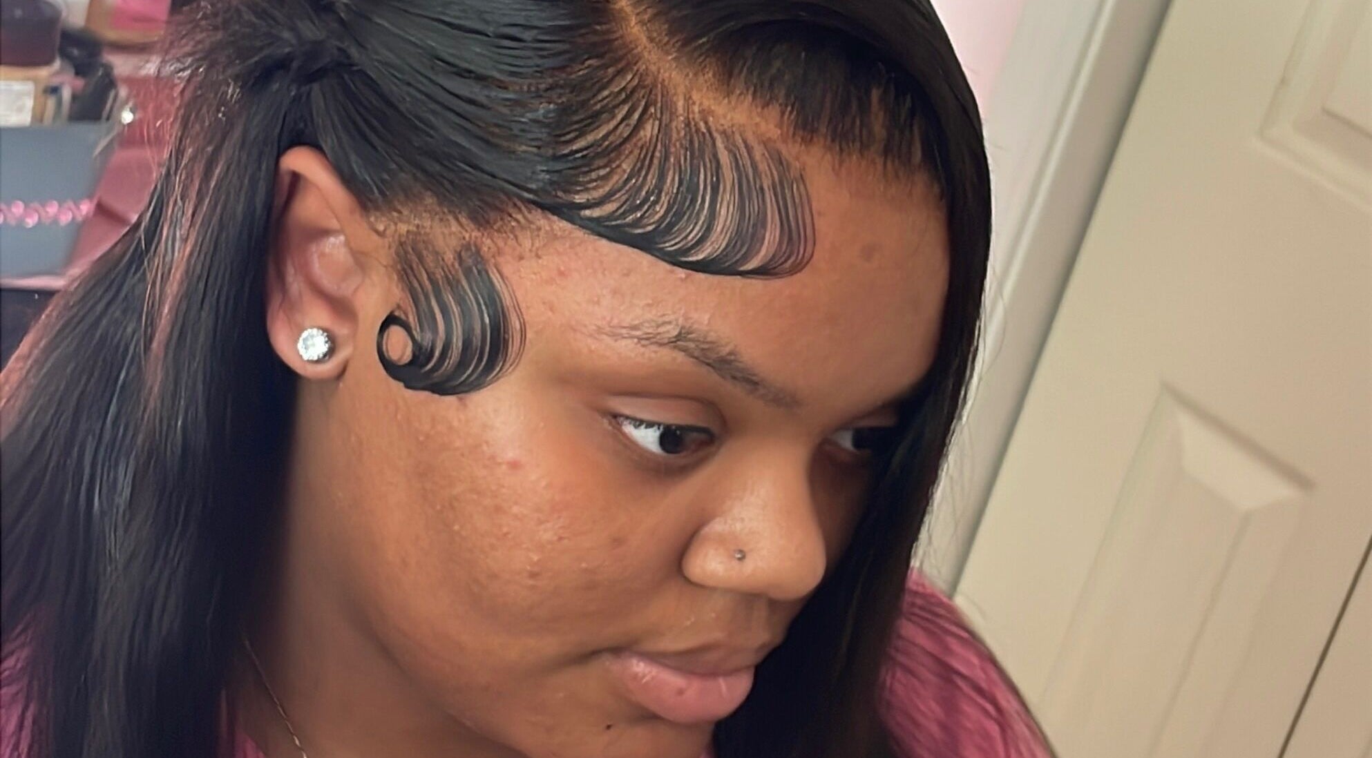 Detailed hair design displayed at LuxuryLaced, St. Marys, Georgia, US, showcasing sleek style and expert craftsmanship.