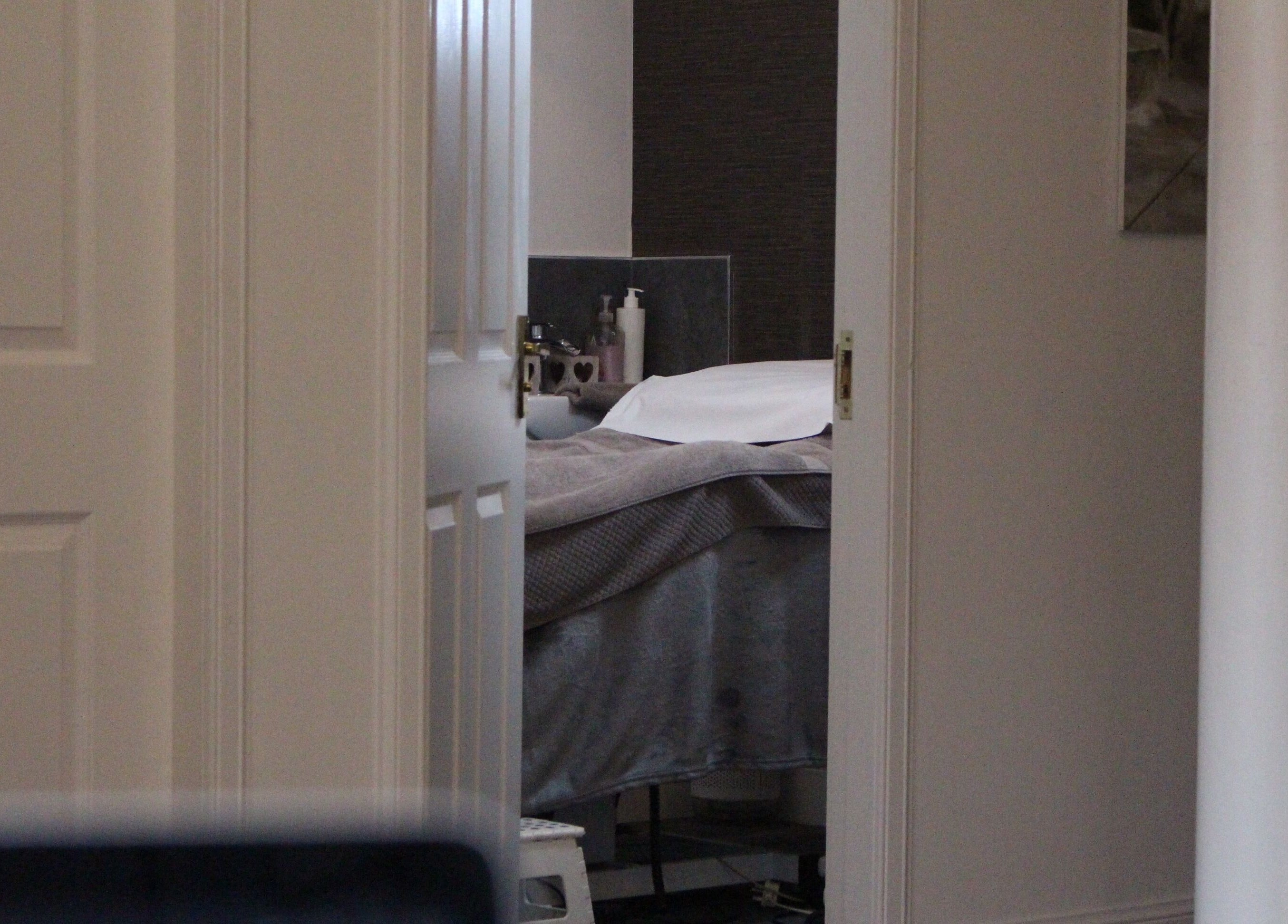 Wellness room at Identity of Broughty Ferry, Dundee, Scotland, GB, featuring a massage table and calming decor.