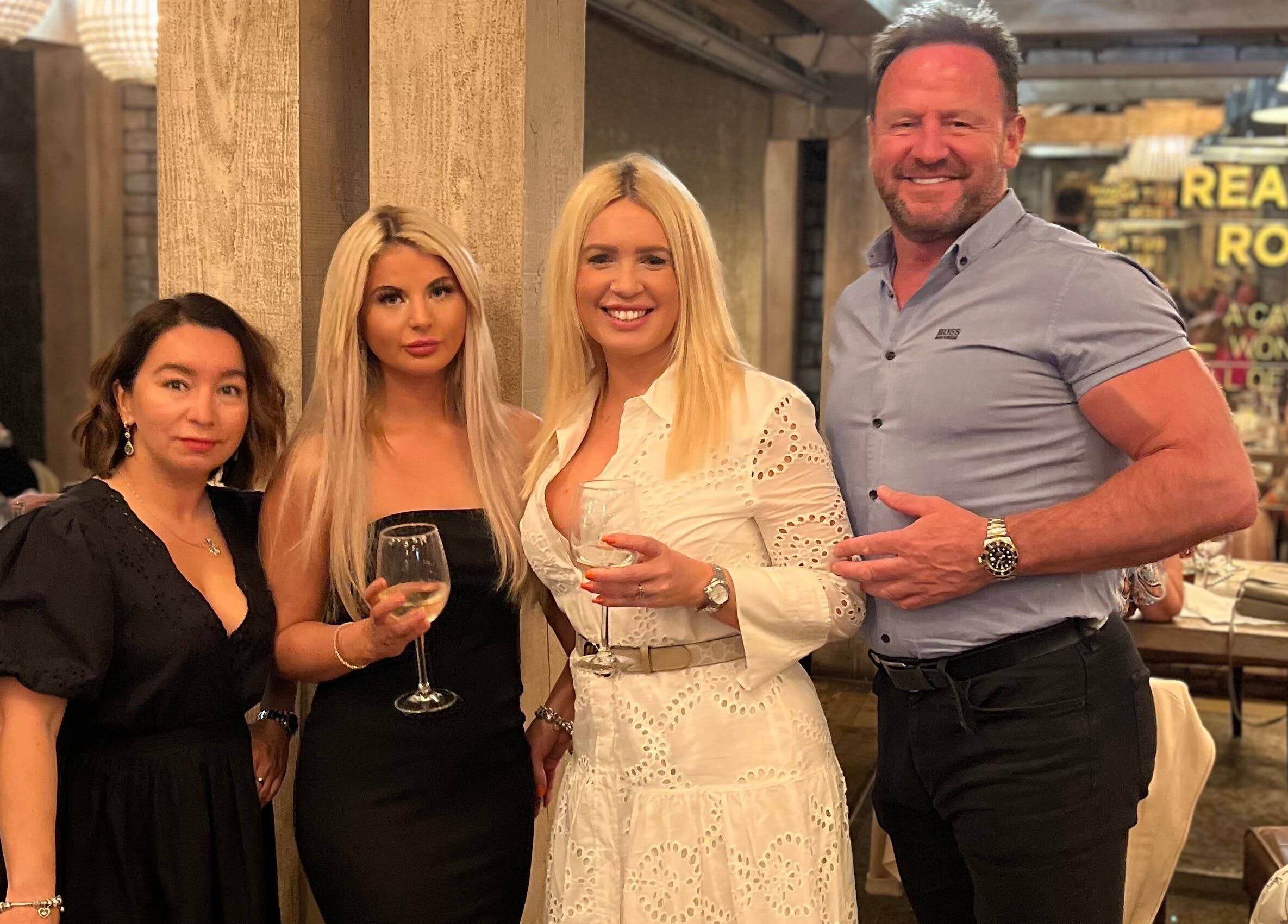 Group enjoying at Identity of Broughty Ferry, Dundee, Scotland, GB, exuding elegance and joy.