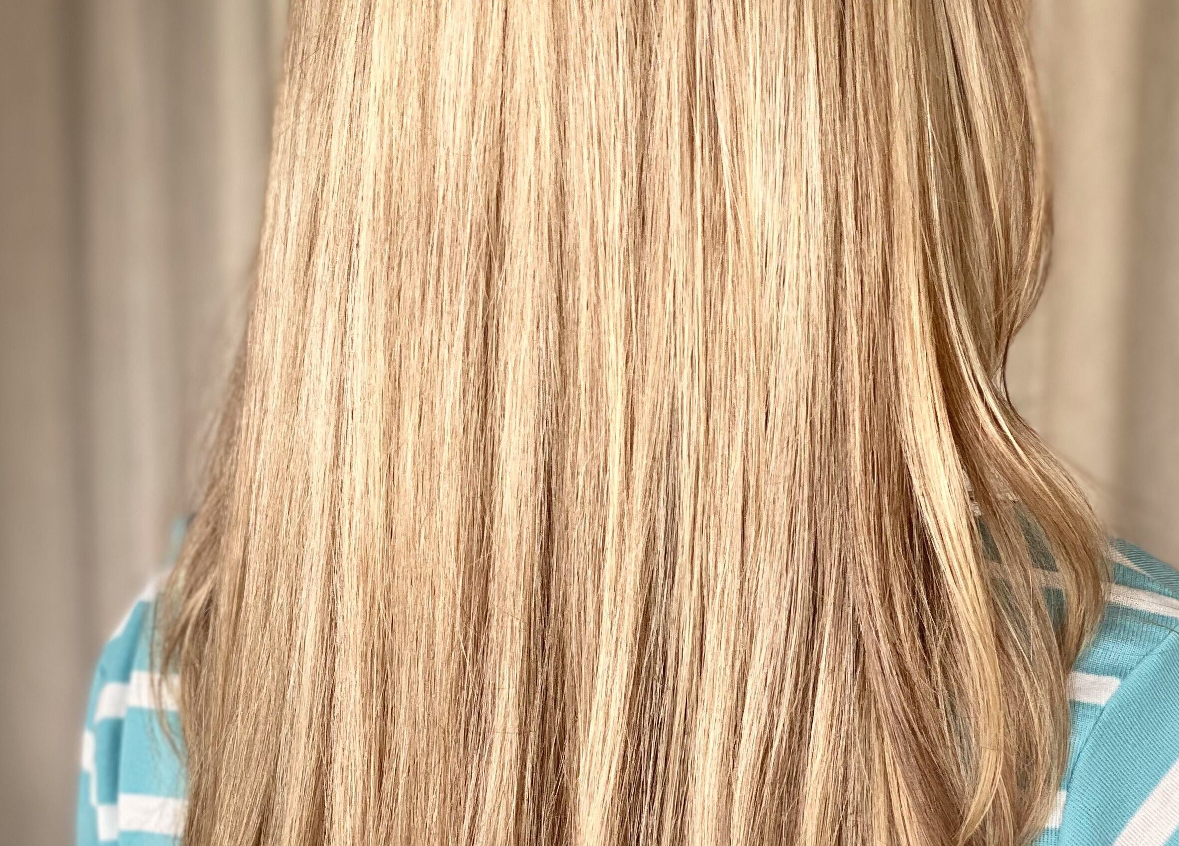 Smooth, blonde hair styled at Alchimie Colorist, Albion, Rivière Noire, MU.