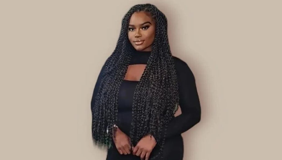 Woman with long, elegant braids at By Resiân, Coventry, England, GB, showcasing beauty and style.