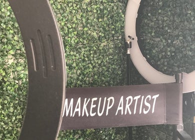 Makeup artist chair and ring light at Eunique Faces, Bridgetown, Saint Michael, BB, set against a green wall.