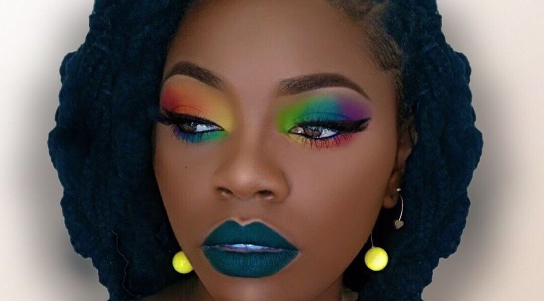 Vibrant rainbow eye makeup at Eunique Faces, Bridgetown, Saint Michael, BB showcasing unique beauty artistry.