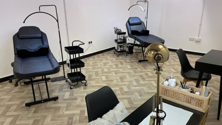 Modern beauty treatment room at Maia Emily Beauty in Derby, England, GB, featuring salon chairs and equipment.