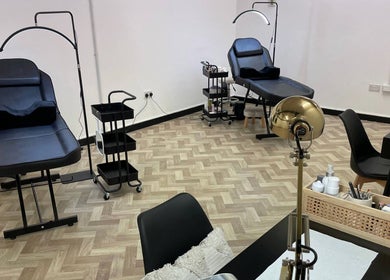 Modern beauty treatment room at Maia Emily Beauty in Derby, England, GB, featuring salon chairs and equipment.