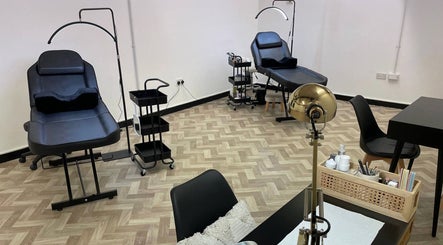 Modern beauty treatment room at Maia Emily Beauty in Derby, England, GB, featuring salon chairs and equipment.