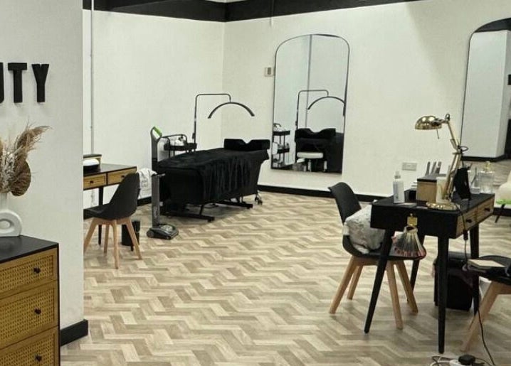 Modern beauty lounge at Maia Emily Beauty, Derby, England, GB, featuring stylish decor and treatment areas.