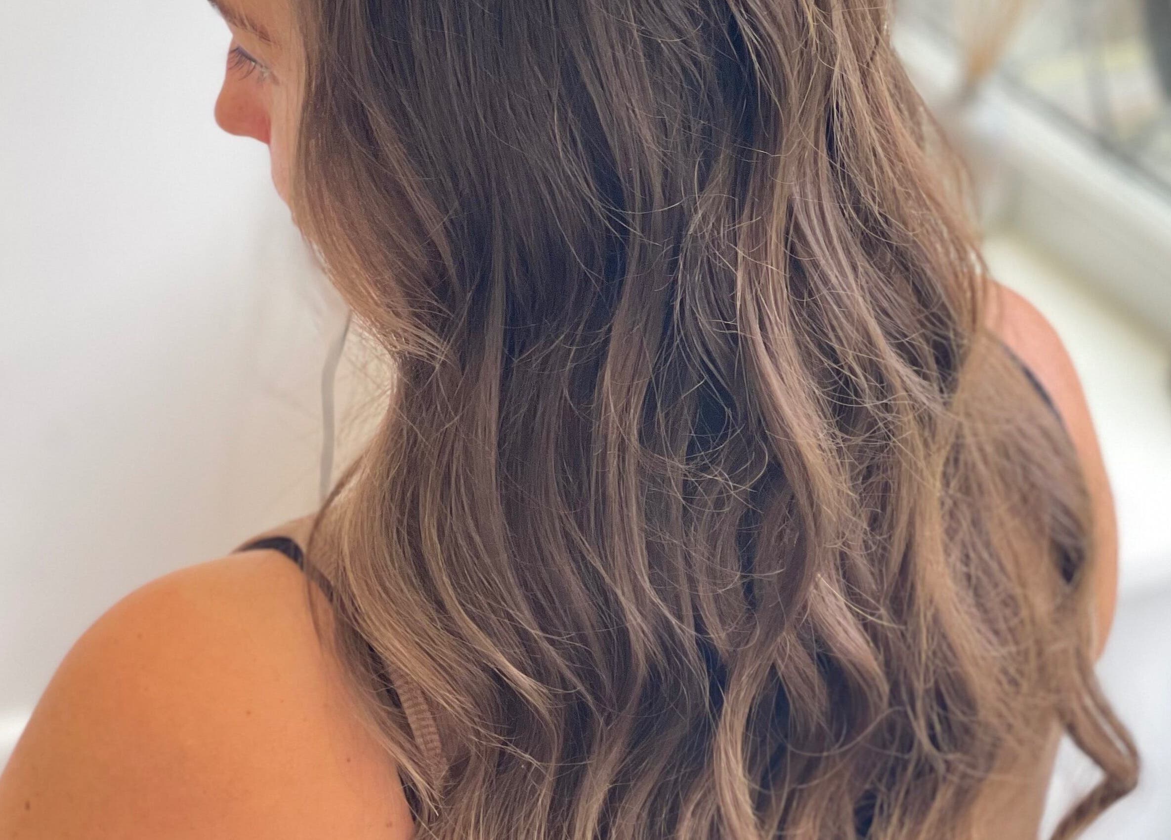 Elegant wavy hairstyle at Josephine's Beauty, Thorrington, England, GB. Perfect for any occasion.