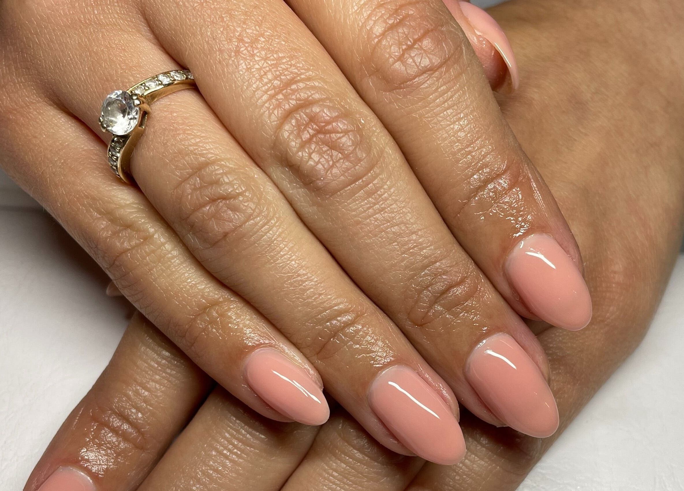 Beautiful pink manicured nails at Josephine's Beauty, Thorrington, England, GB.