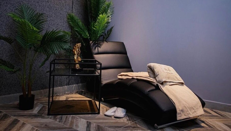 Luxurious spa lounge at 1948 in Muscat, Muscat Governorate, OM with plush seating and calming decor.