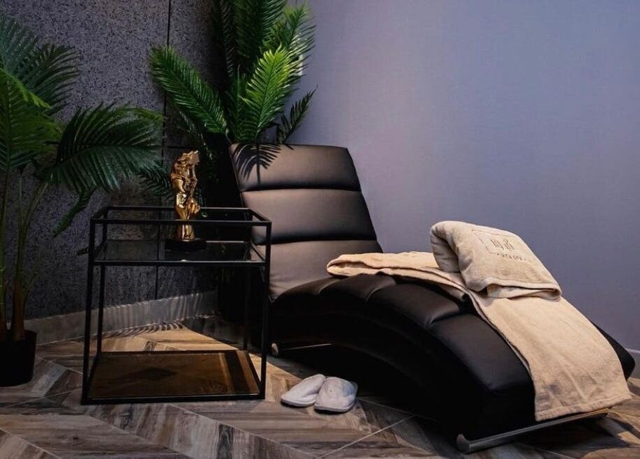 Luxurious spa lounge at 1948 in Muscat, Muscat Governorate, OM with plush seating and calming decor.