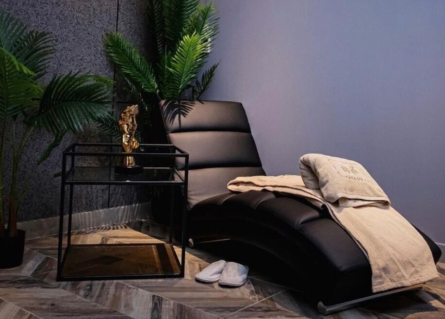 Luxurious spa lounge at 1948 in Muscat, Muscat Governorate, OM with plush seating and calming decor.