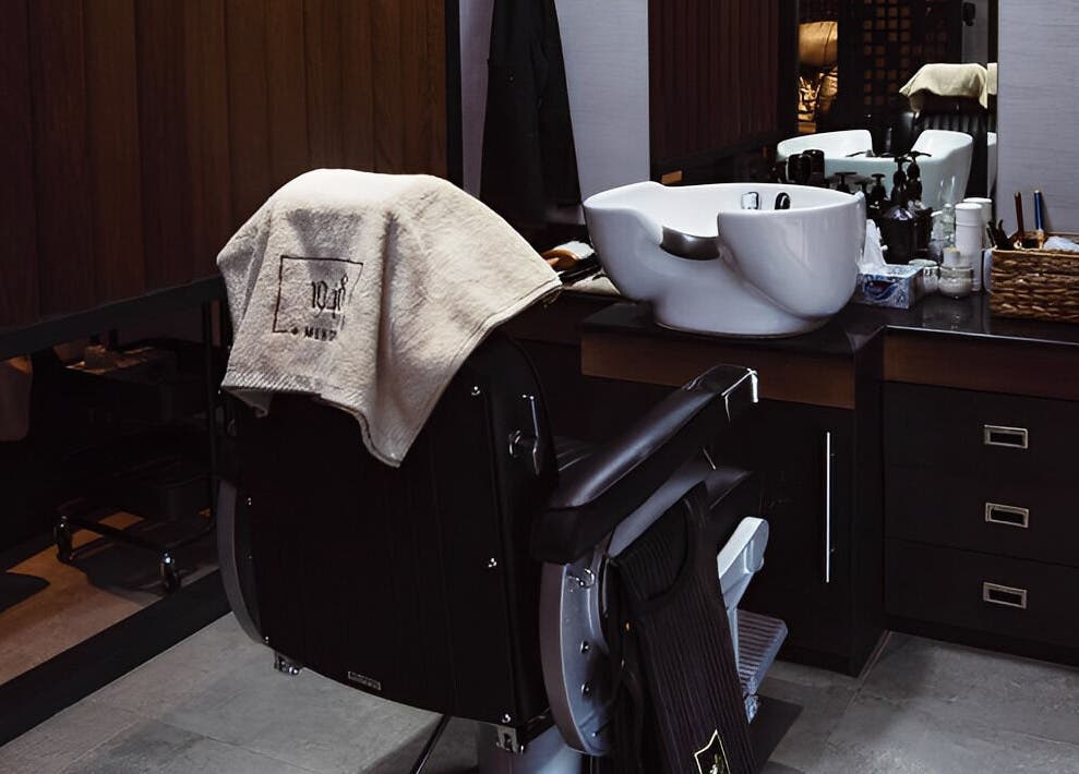 Luxurious salon chair and washbasin at 1948, Muscat, Muscat Governorate, OM, offering premium services.
