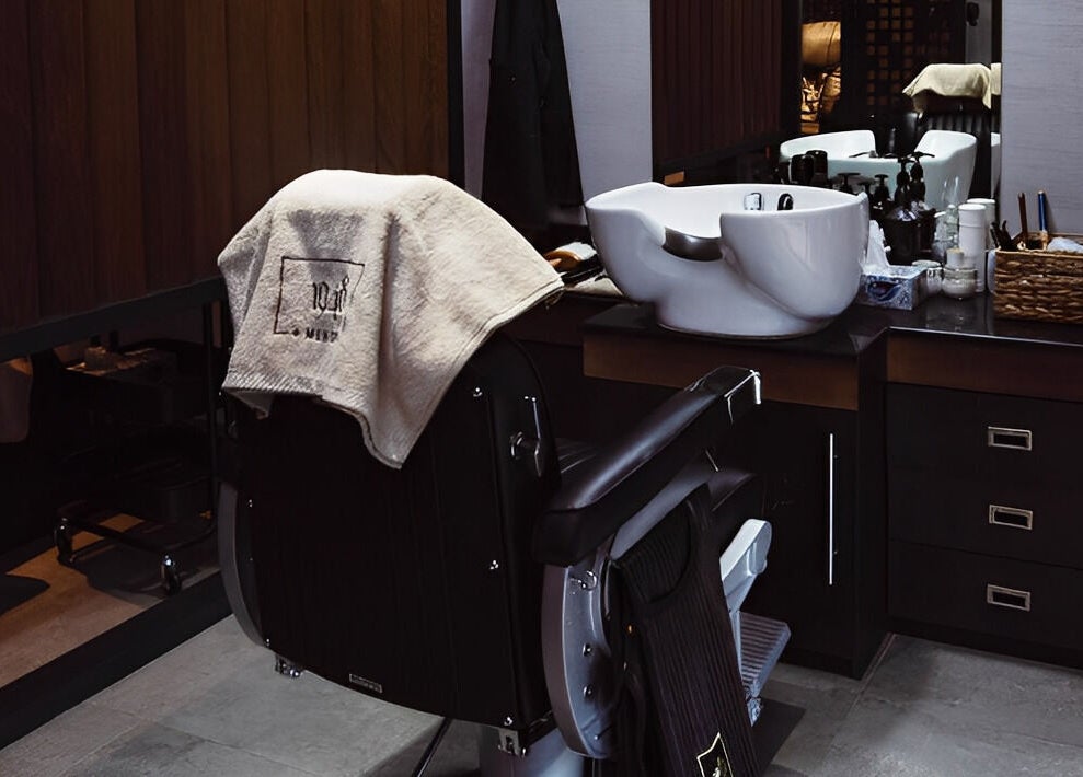 Luxurious salon chair and washbasin at 1948, Muscat, Muscat Governorate, OM, offering premium services.