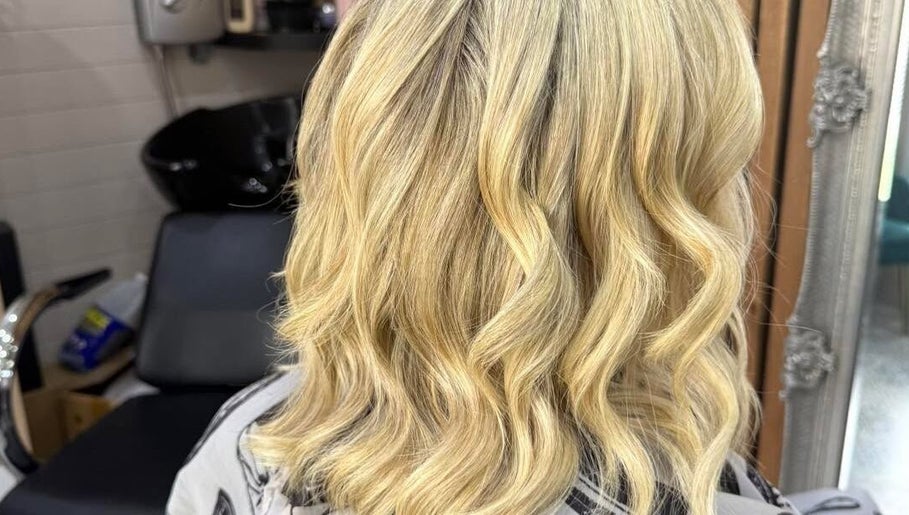 Blonde wavy hairstyle at CMCA Hair and Nails, Lurgan, Northern Ireland, GB salon.