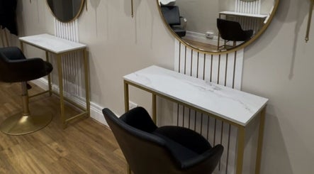 Grace Hunter Hair and Makeup in Stockton-on-tees, England, GB, elegant salon station with marble and gold accents.